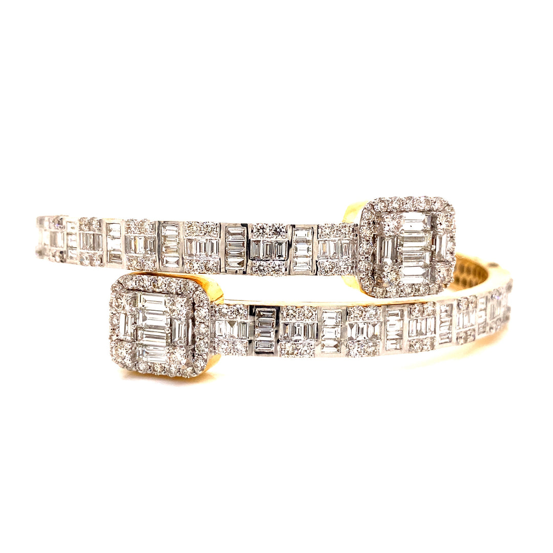 White baguette diamonds placed on 14 karat yellow gold. 