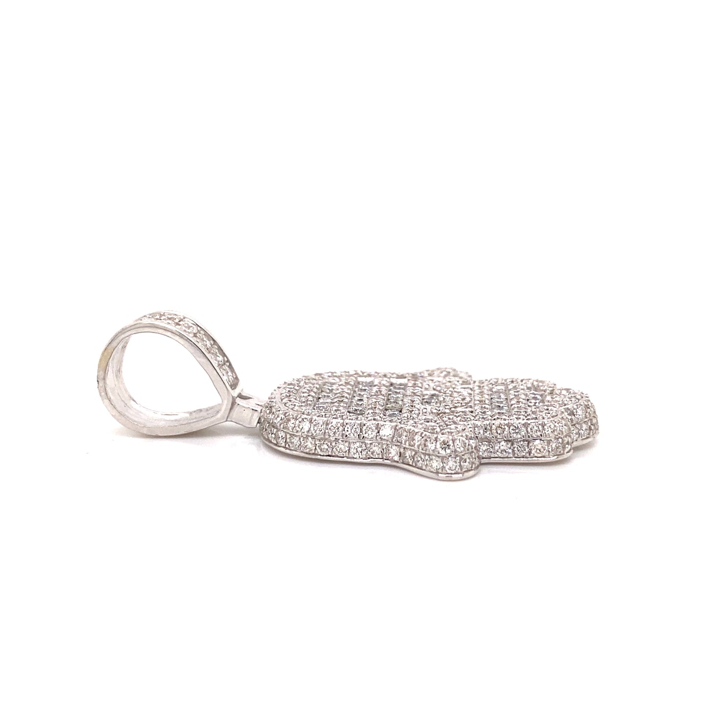 White gold diamond Hamsa pendant laid down.