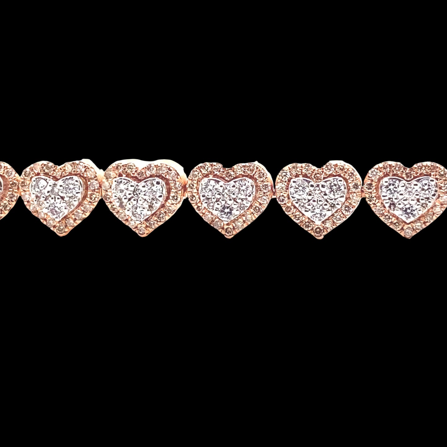 Diamond heart shaped links designed in both white and rose gold. Diamonds around create a halo heart with white diamonds at the center.