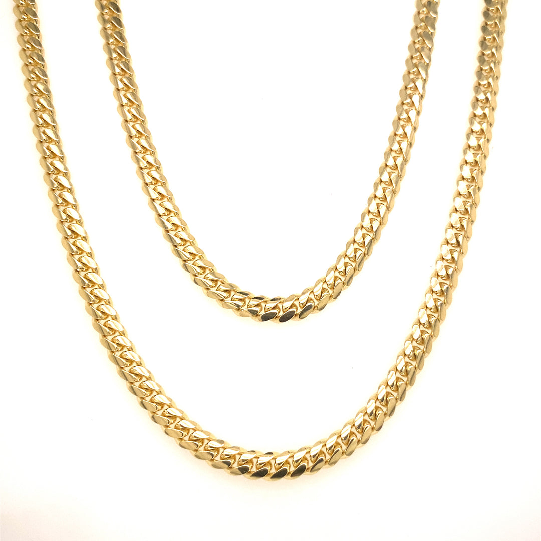 Two yellow gold chains.