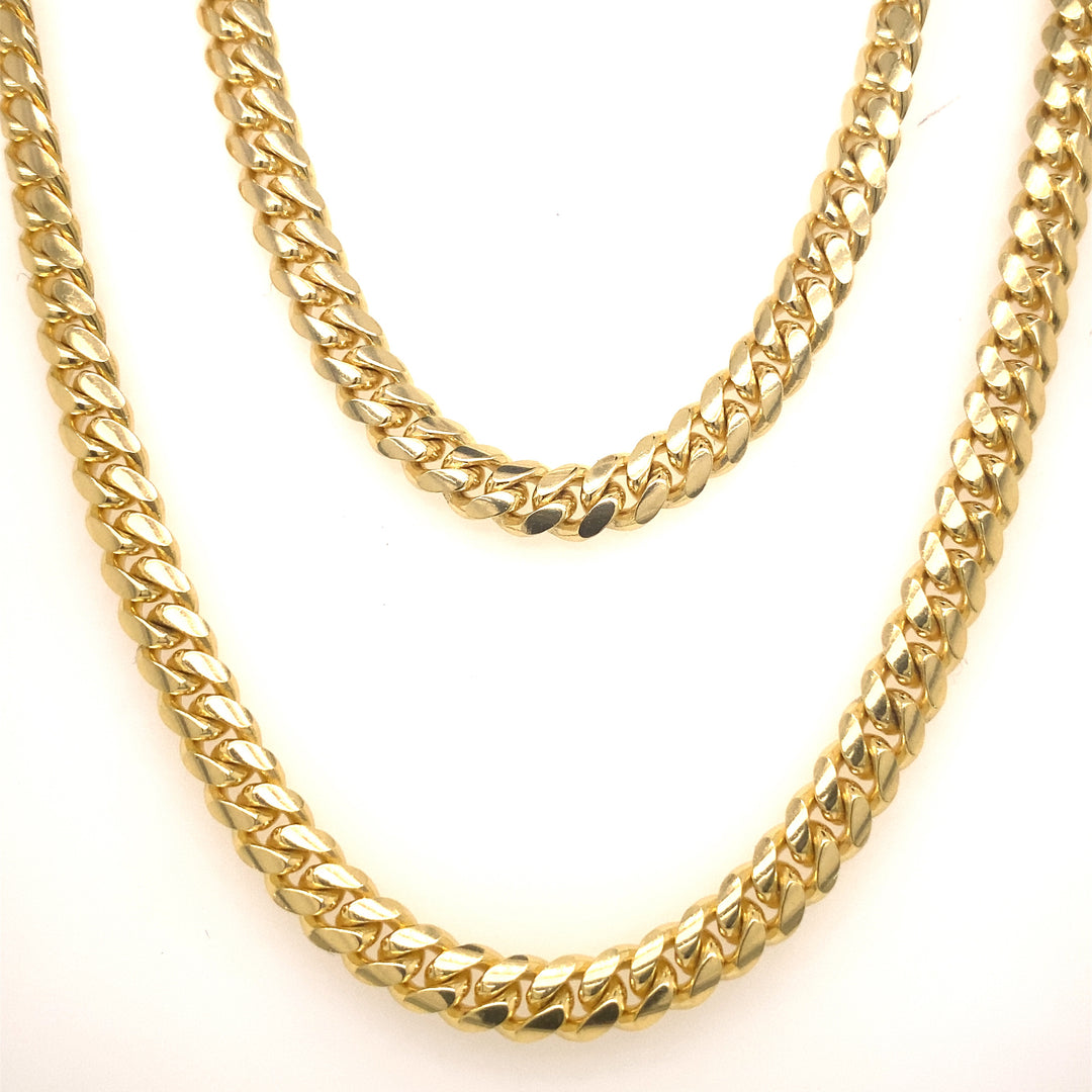 Two yellow gold Cuban link chain. 