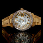 Lady's 18k Gold Rolex With Diamonds
