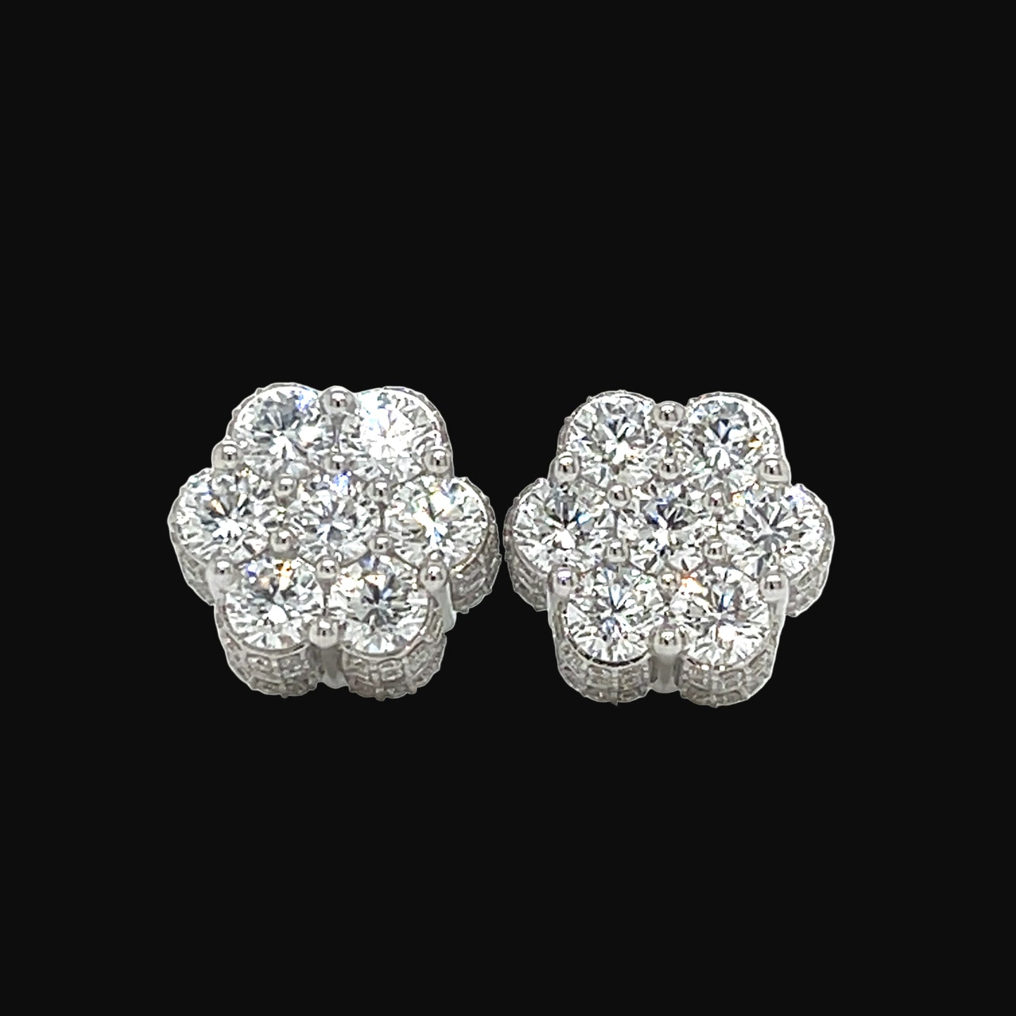 Pair of diamond earrings on a white background