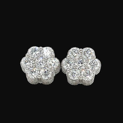 Pair of diamond earrings on a white background
