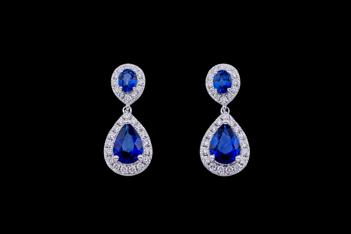ROUND AND PEAR SHAPED BLUE SAPPHIRE AND DIAMOND DROP EARRING