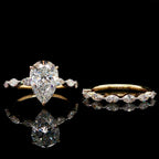 Pear Cut Diamond Engagement Ring with Marquise Band