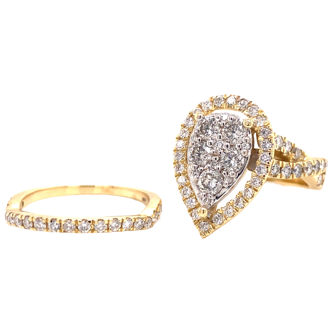 Pear shaped diamond engagement ring set with white round-cut set diamonds.