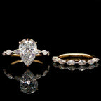 Pear Cut Diamond Engagement Ring with Marquise Band