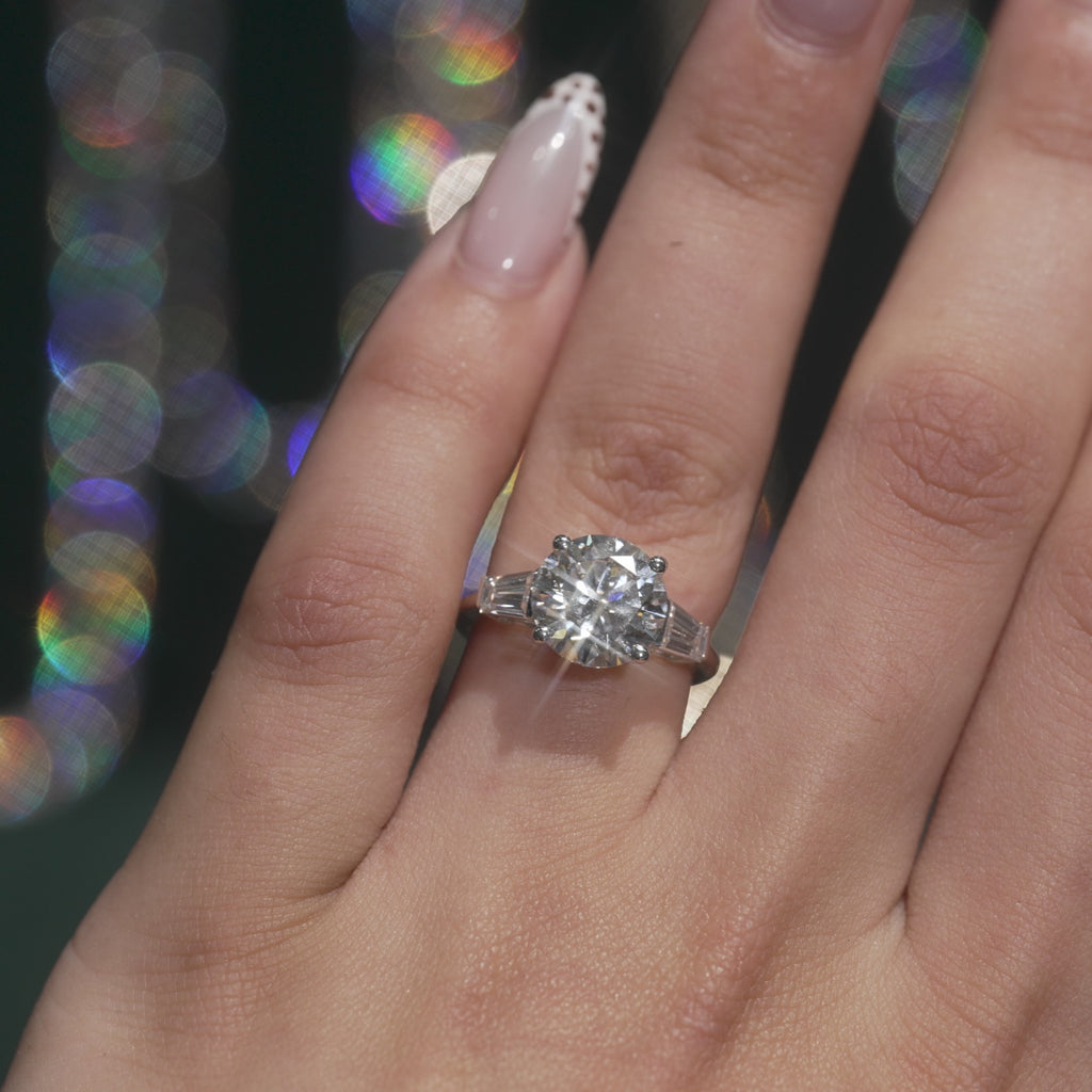 Round Brilliant with Tapered Baguette Engagement Ring