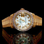 Lady's 18k Gold Rolex With Diamonds