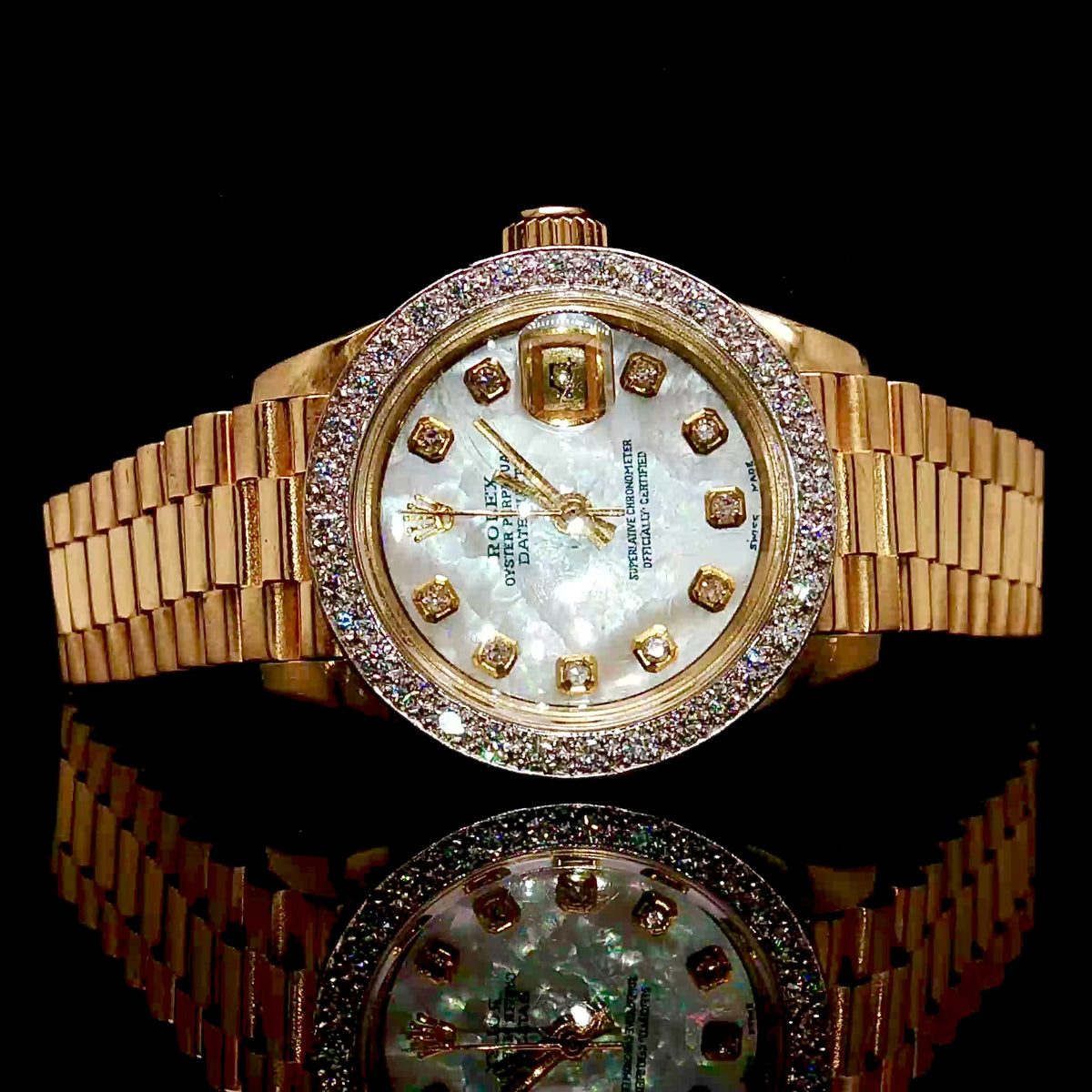 Lady's 18k Gold Rolex With Diamonds