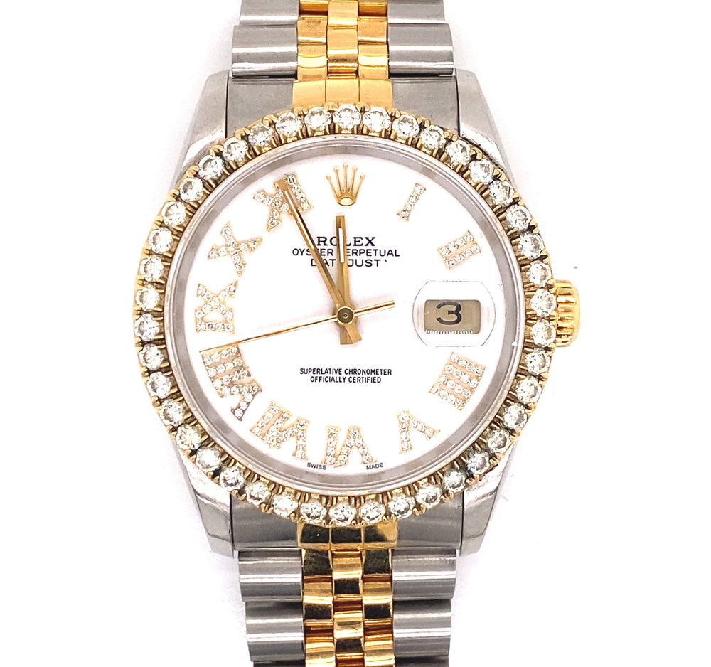 Displayed is a 36MM Rolex Datejust, handcrafted with a jubilee band. A diamond bezel is displayed along with diamond numbers.