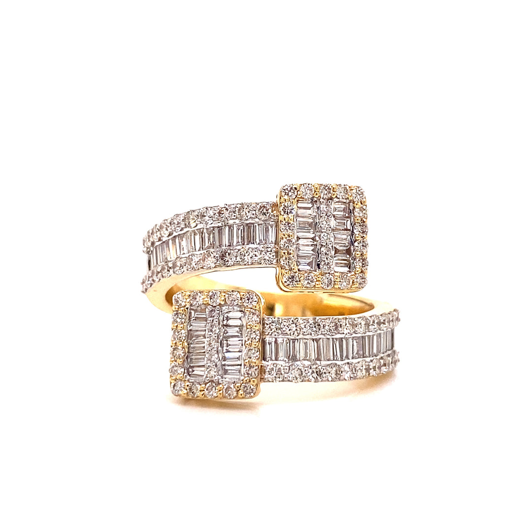 This wrap around ring focuses on a square design and has both round and baguette cut diamonds. The diamonds are set on a solid yellow 14 karat gold ring.