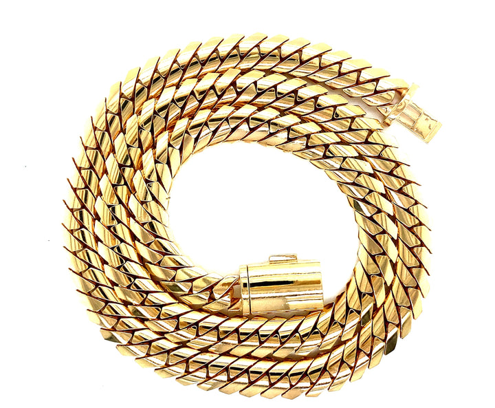 Spiraled yellow gold Cuban chain tightly linked. 10MM thick.