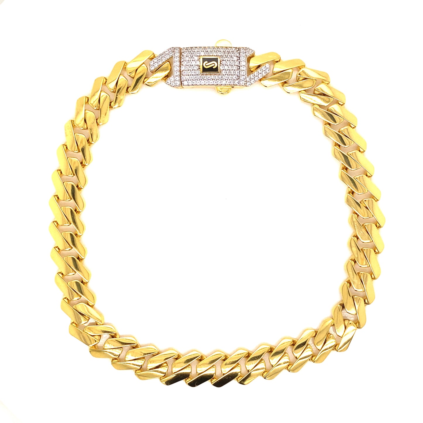Yellow gold Cuban links with white crystal stones on the lock. 