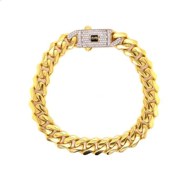 Yellow gold bracelet with white crystal lock.