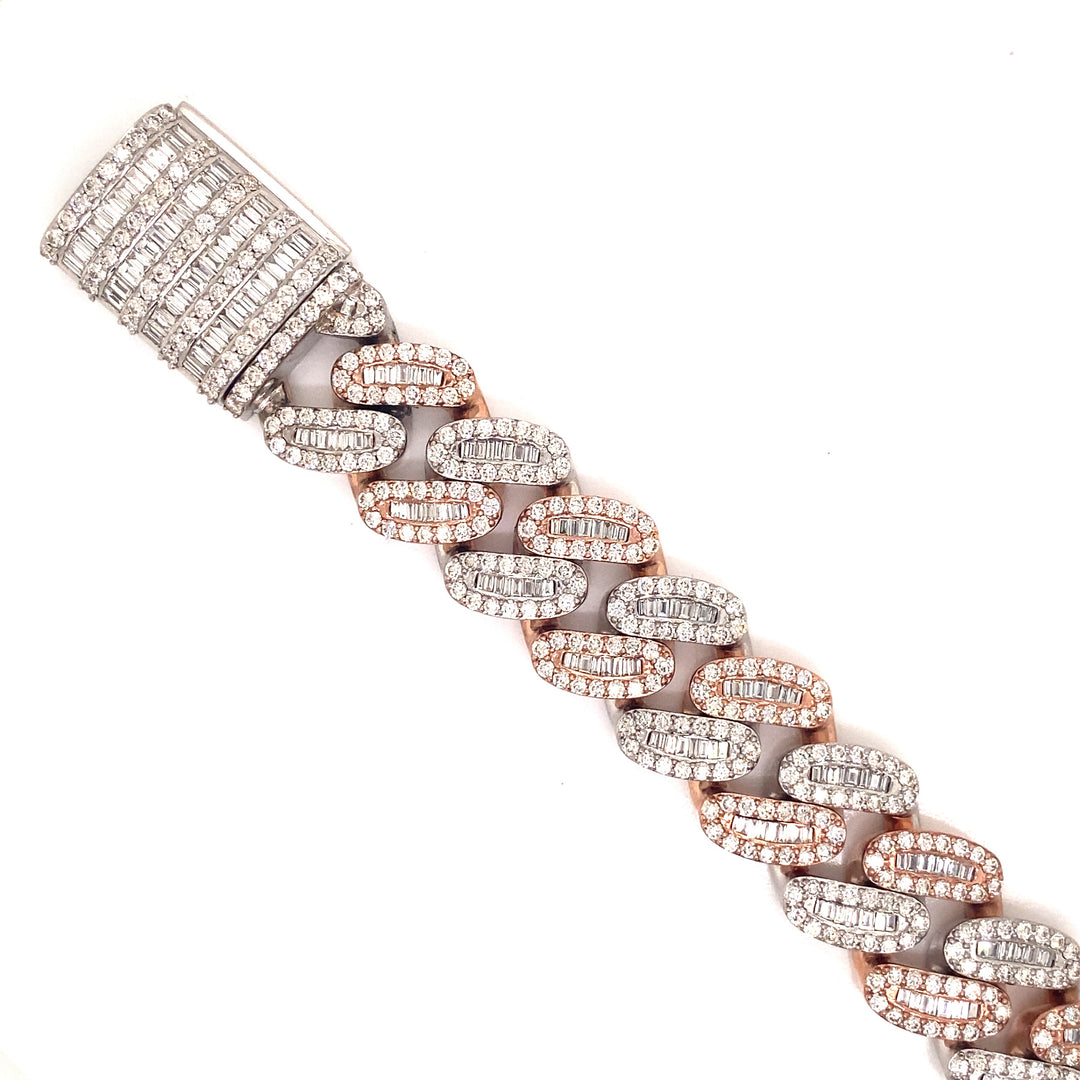 White Diamonds are finely detailed onto this two-tone white and rose gold bracelet. The lock on this bracelet has white baguette diamonds detailed on a white gold lock. 