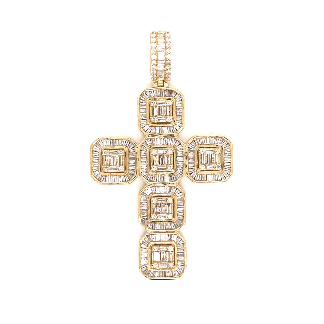 Yellow gold and diamond baguette cross. 