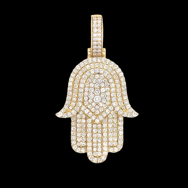 White diamond stones made in a round-cut form and placed on yellow gold hamsa shaped pendant. 
