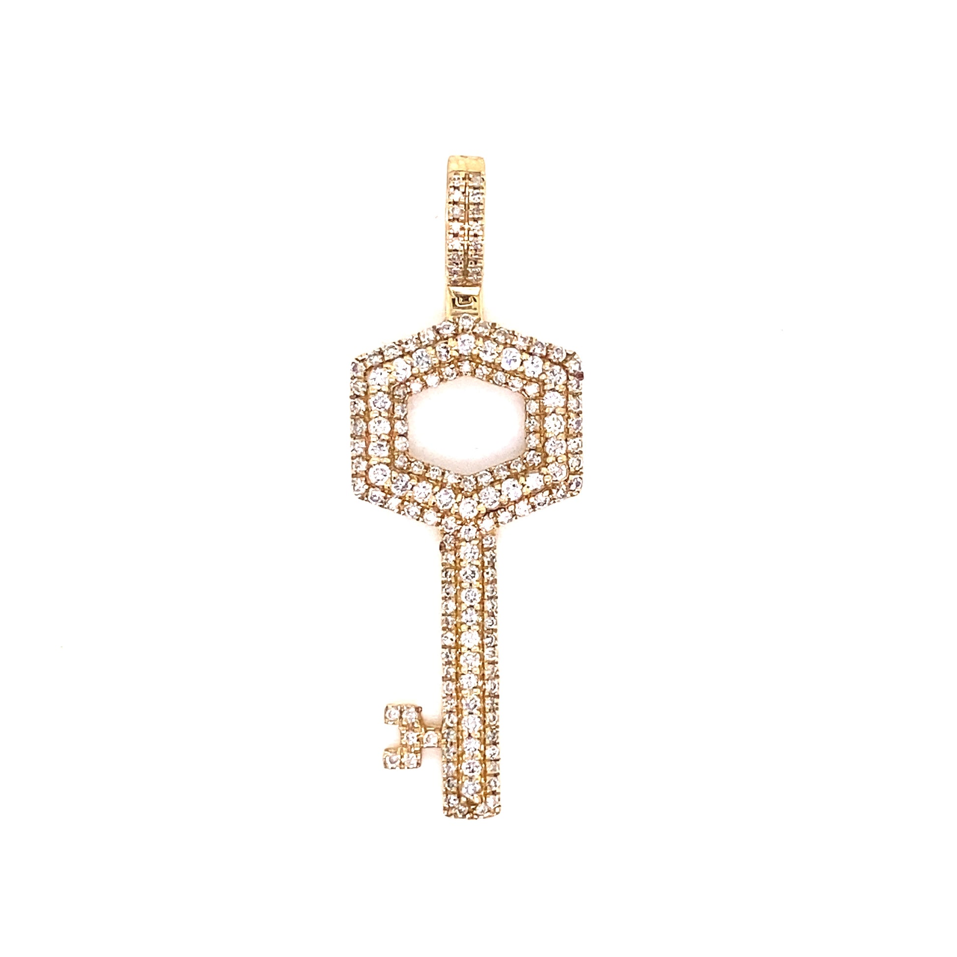 Key diamond pendant in yellow gold.