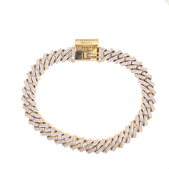 The lock on this Cuban link bracelet is built securely with a yellow gold box lock.