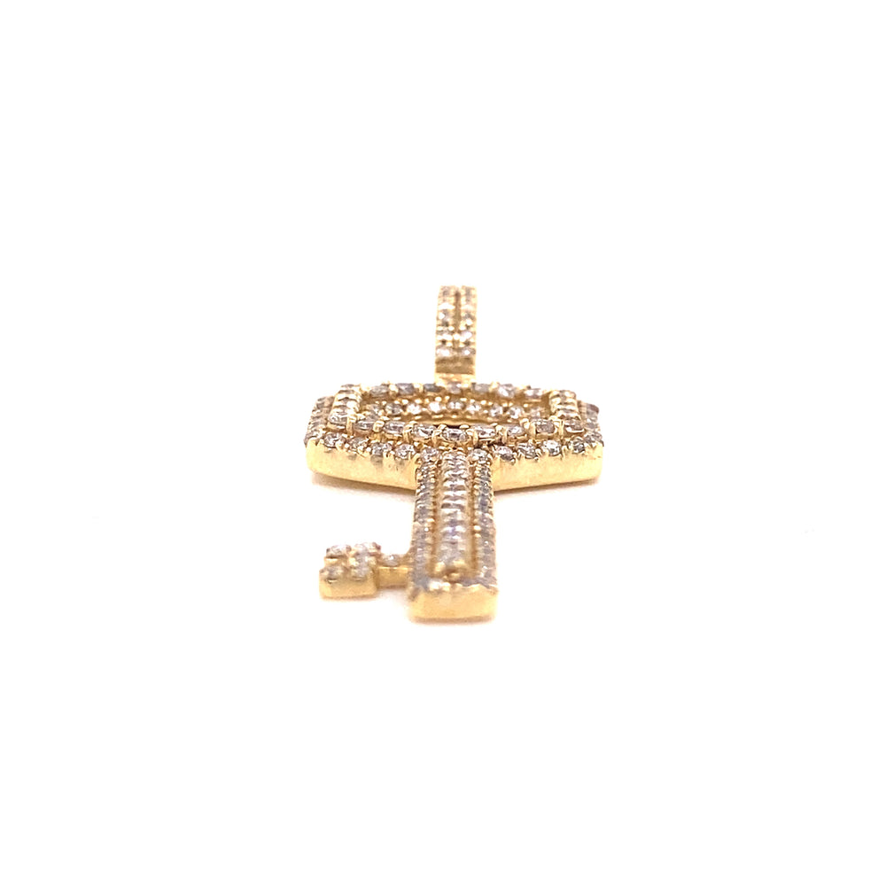 Yellow gold and diamond key pendant.