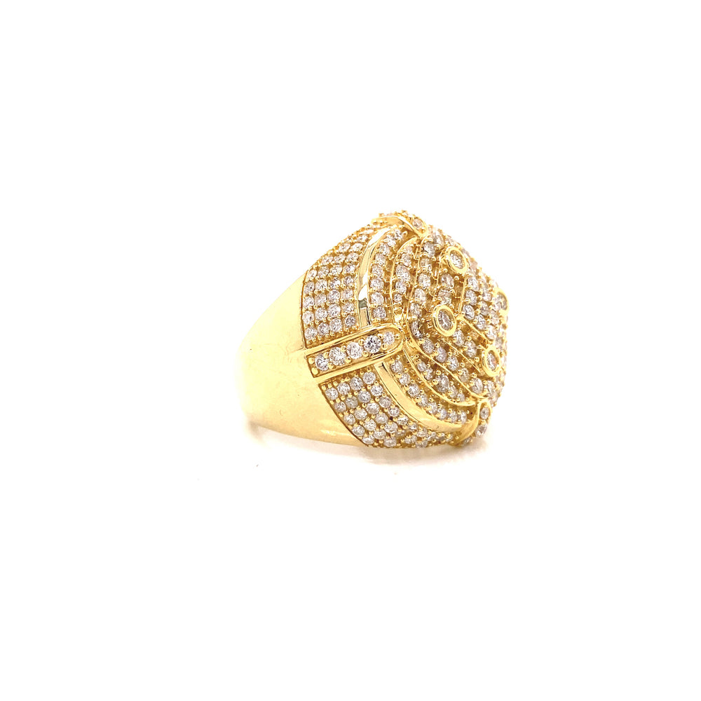 Yellow gold and diamond ring with multi-dimensional stones. Different shapes aren included in this design as well as triangle and round. 