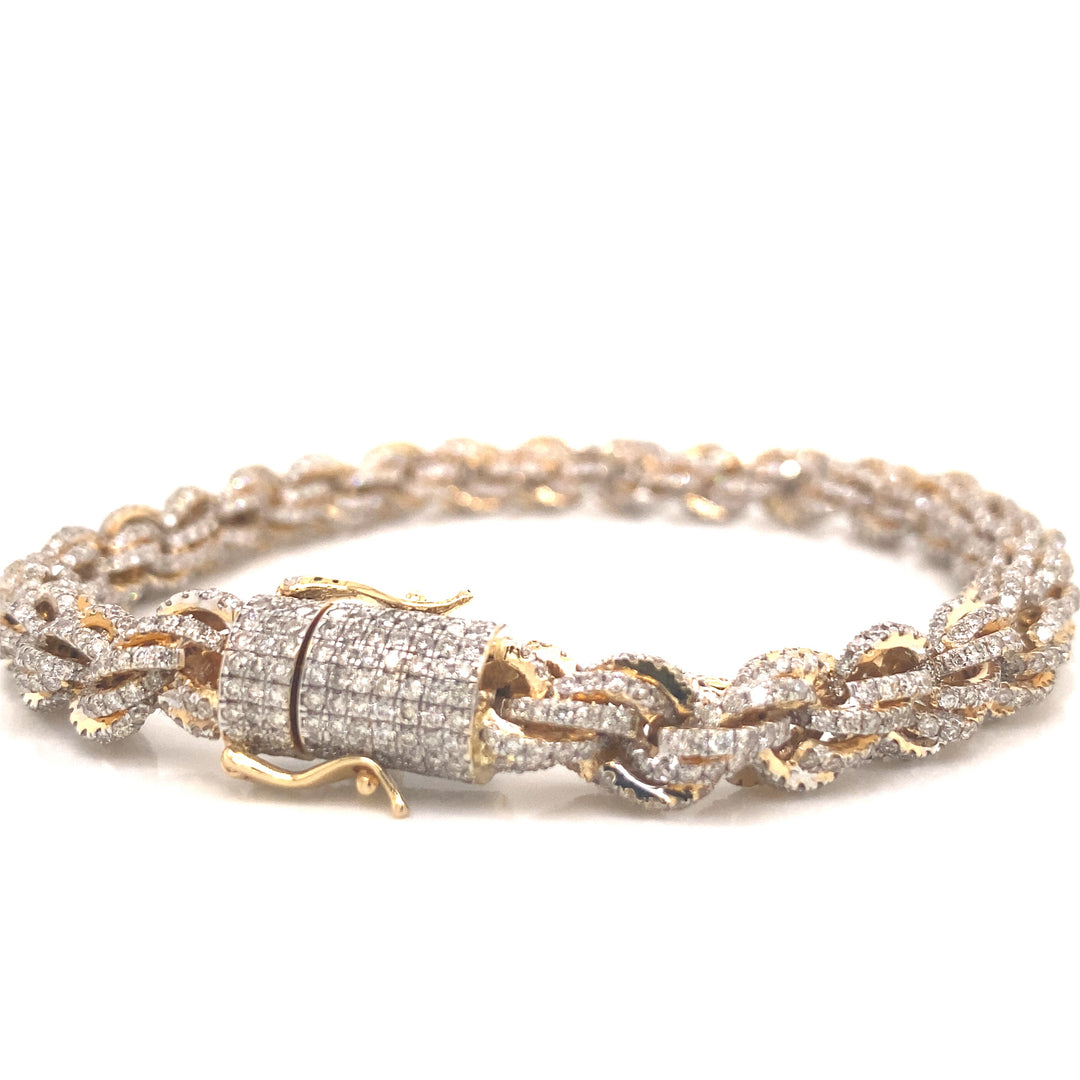 This diamond rope chain bracelet is held together by this diamond lock with pressured clasp.
