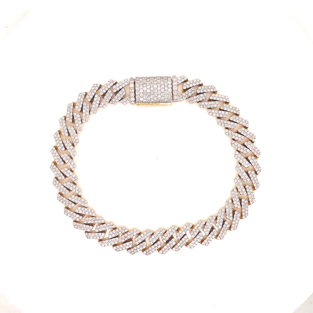 Diamond Cuban bracelet is detailed with white VS clarity diamond stones and is handcrafted on solid yellow gold.