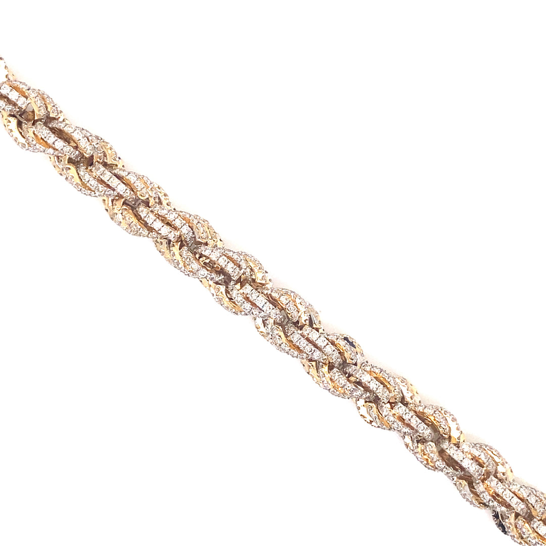 Finely detailed with white pave style high-clarity diamonds, this bracelet is built in rope chain style.