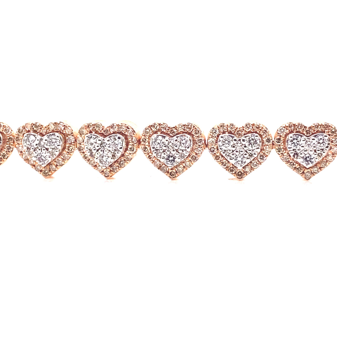 Diamond heart shaped links designed in both white and rose gold. Diamonds around create a halo heart with white diamonds at the center.