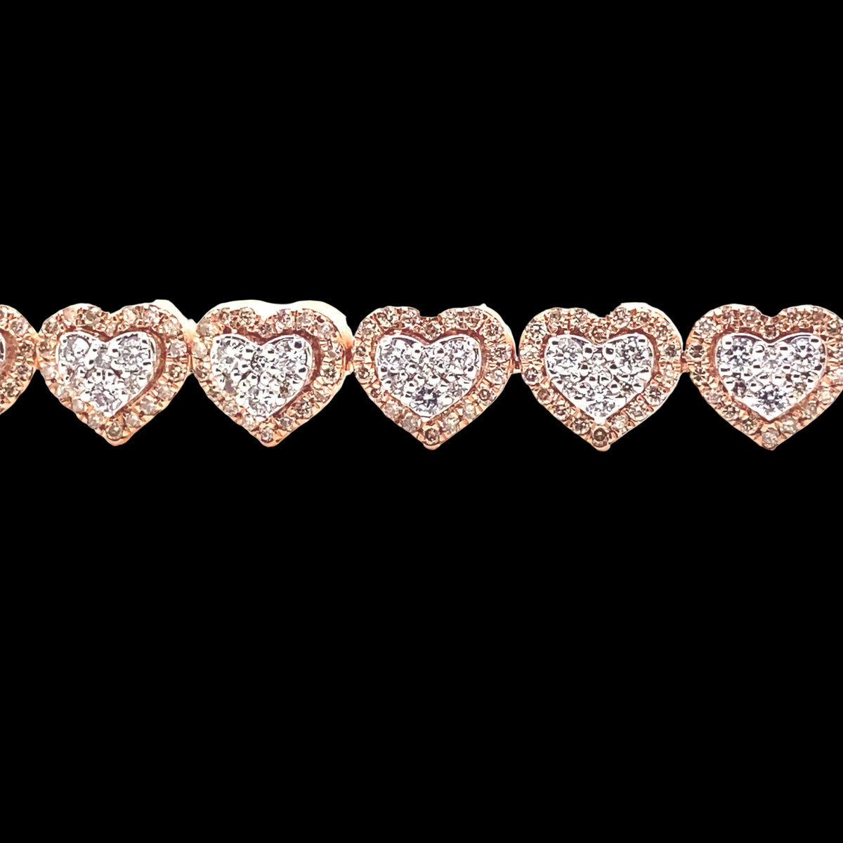 Diamond heart shaped links designed in both white and rose gold. Diamonds around create a halo heart with white diamonds at the center.