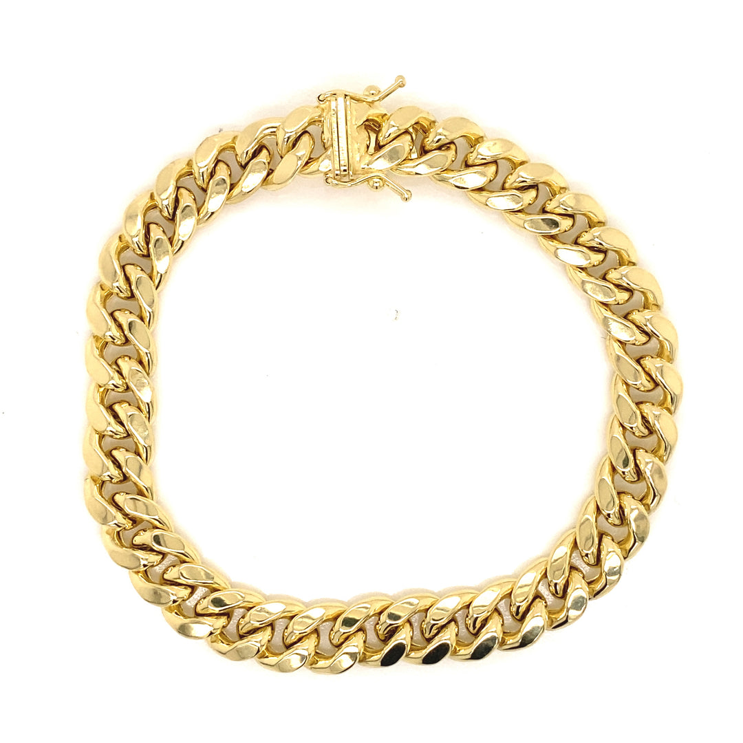 Semi-solid yellow gold Cuban chain with clasps.