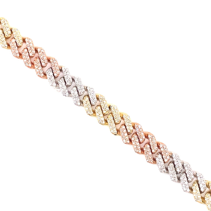 Yellow, white, rose gold is displayed on this Cuban link chain. White diamonds are placed throughout. 