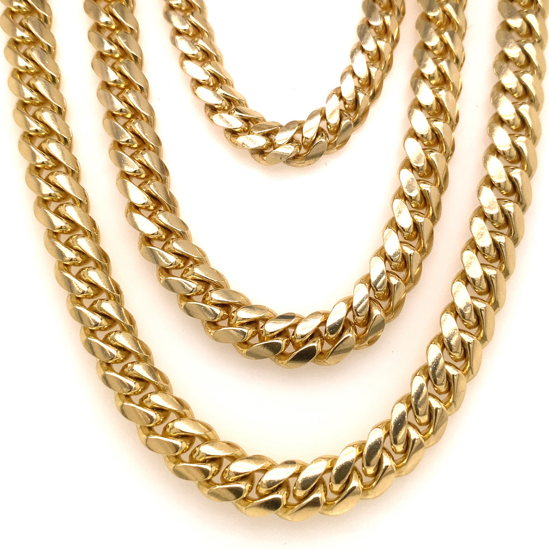 Three yellow gold Cuban chains.