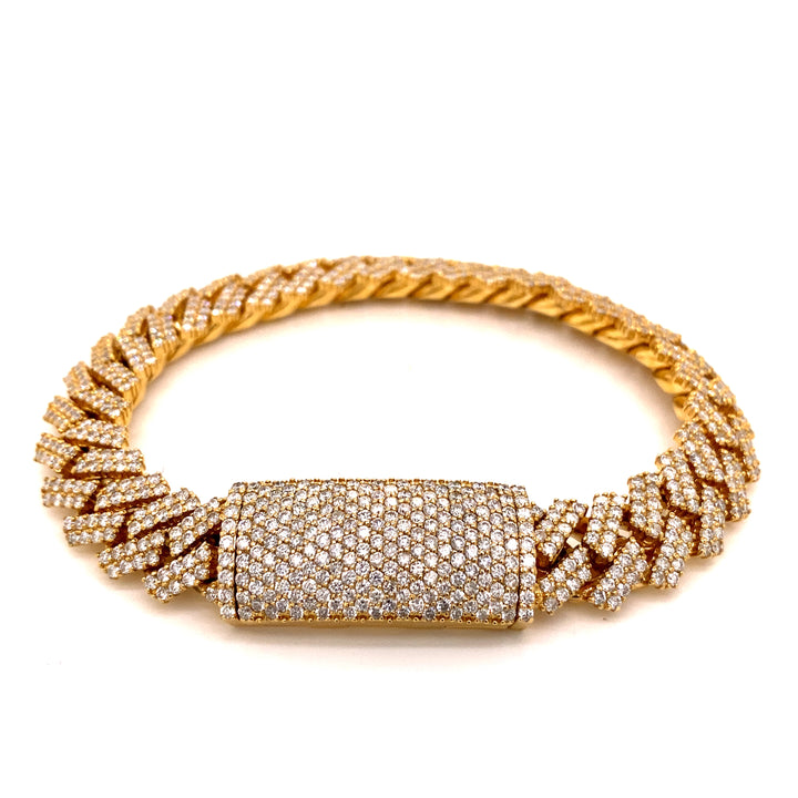 Big diamond Cuban link bracelet built in solid 14 karat yellow gold. Large box lock displayed at the center. 